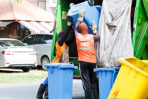 Team clearing garden debris efficiently