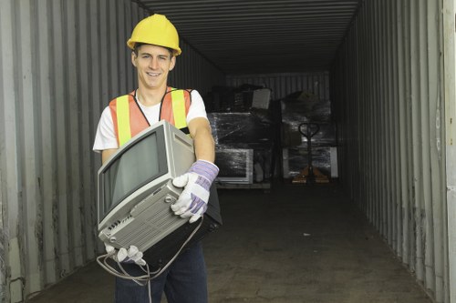Sorting recyclables during a Willesden house clearance